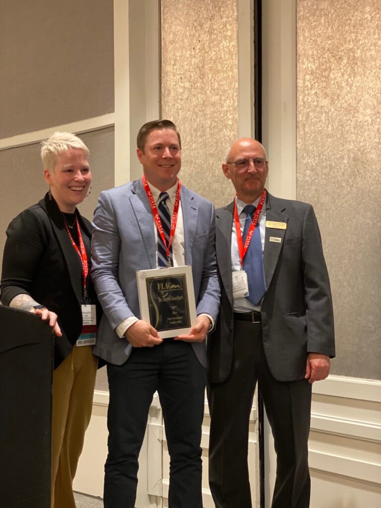 Grant Gearhart presented with leadership award from Foreign Language Association of Georgia