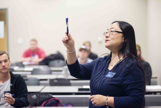 Georgia Southern professor in front of class room teaching