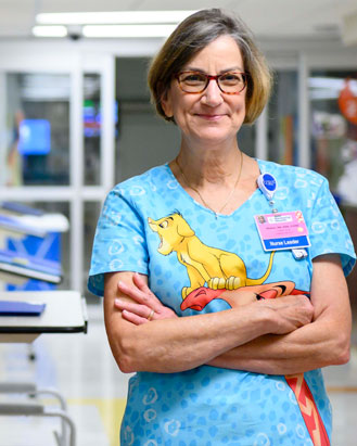 Georgia Southern RN to BSN faculty member Sharen Martin, BSN, RN, CCRN, stands in a clinical environment.