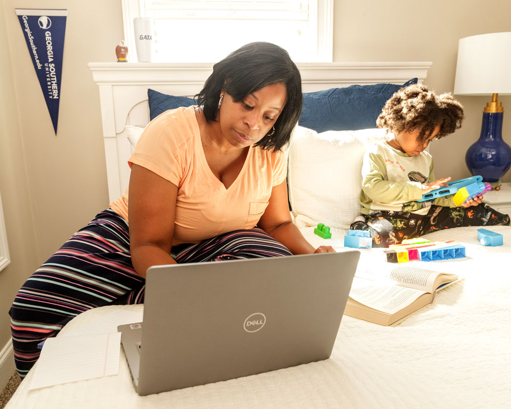 A Georgia Southern student earns her degree online from home while parenting.