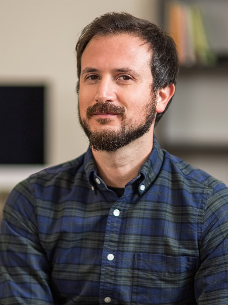 Headshot of Professor Mete Akcaoglu