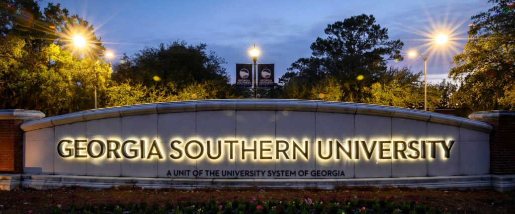 The sign, lit up at night, for Georgia Southern's Armstrong Campus in Savannah