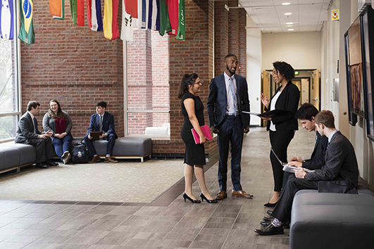 A group of georgia southern students put the finishing touches on their speeches for international studies.