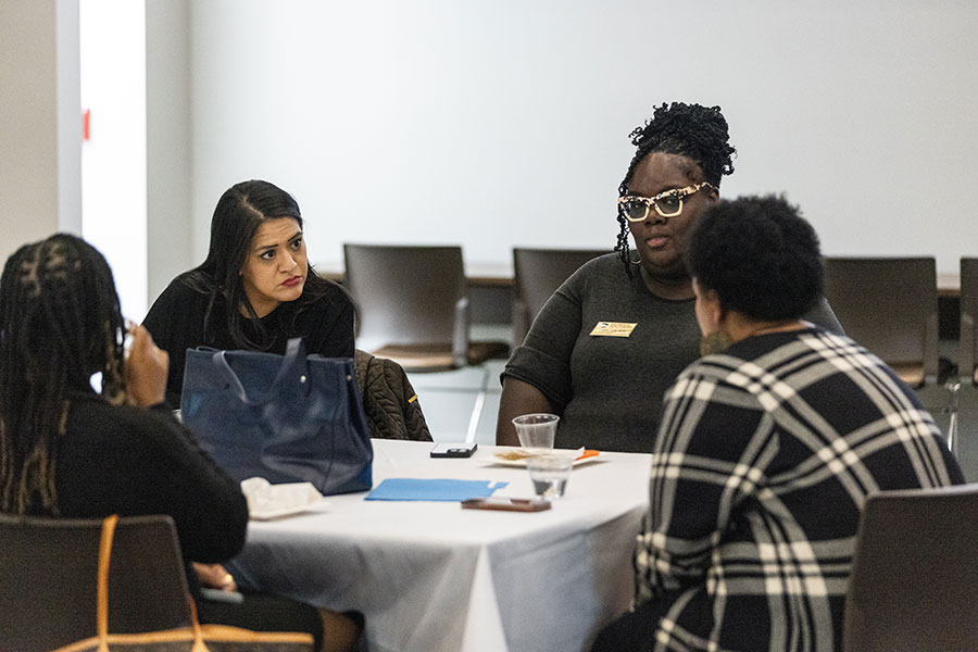 A group of people have discussion at the table