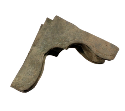 An angled piece of metal that looks like the corner of a picture frame.