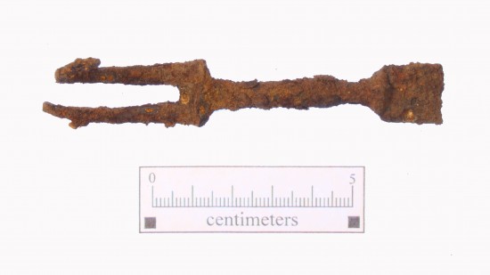 A rusted fork with two tines approximately 10 centimeters long.