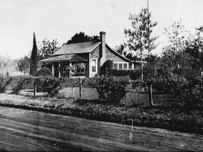 A very old photograph of a house.