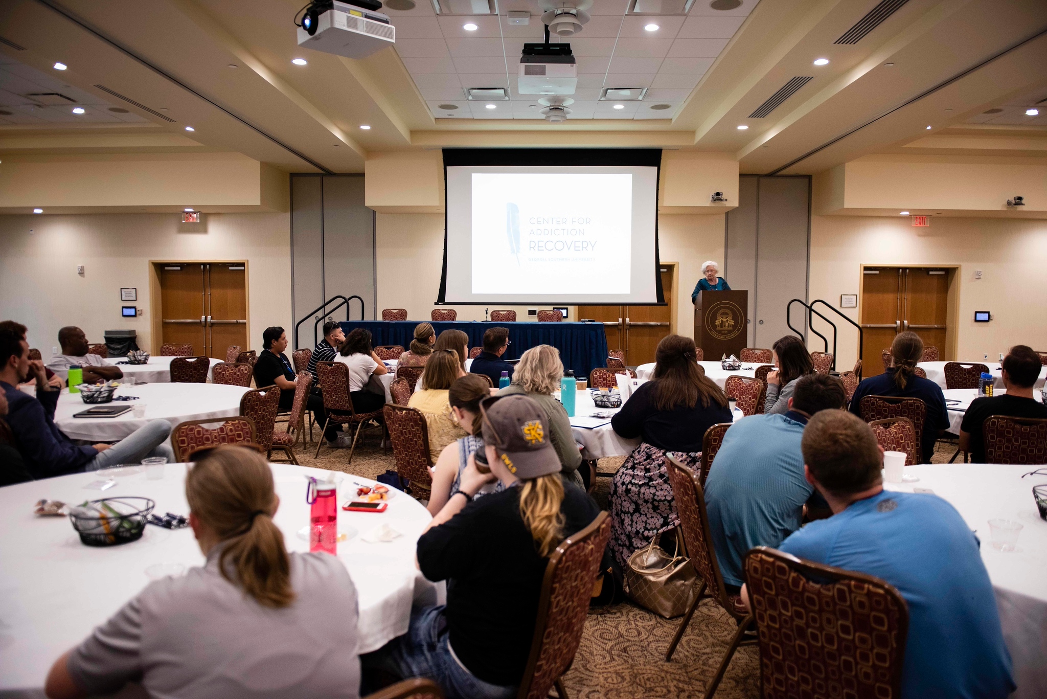 students gathered at an event put on by the Center for Addiction Recovery