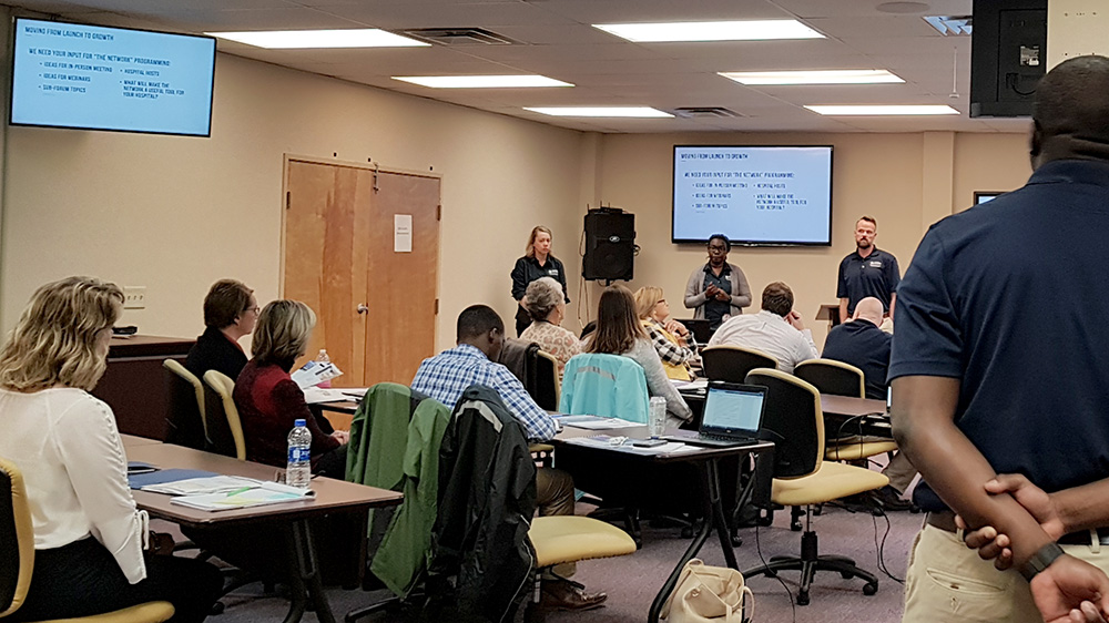 students and faculty in a classroom