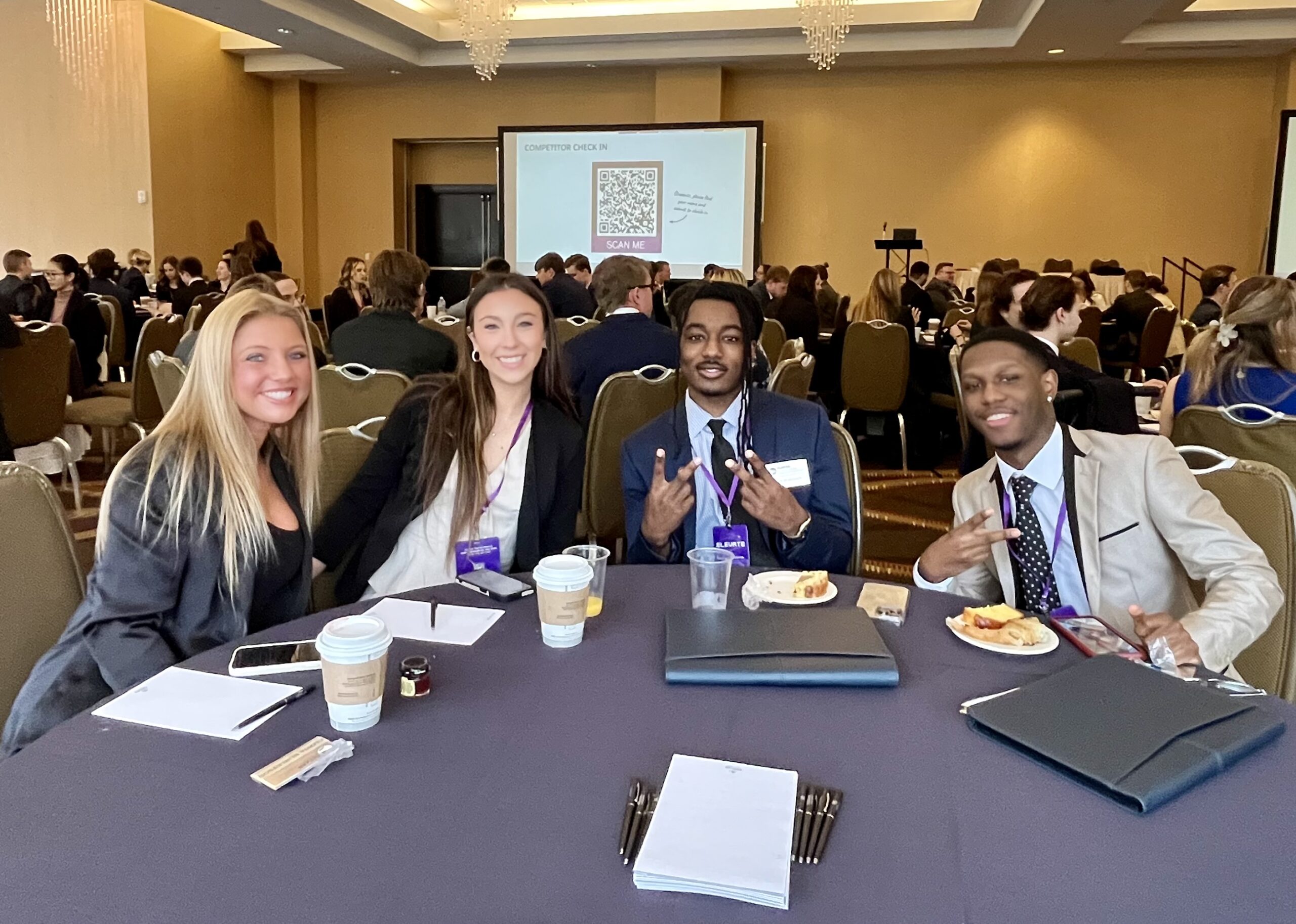 students attending sales meeting