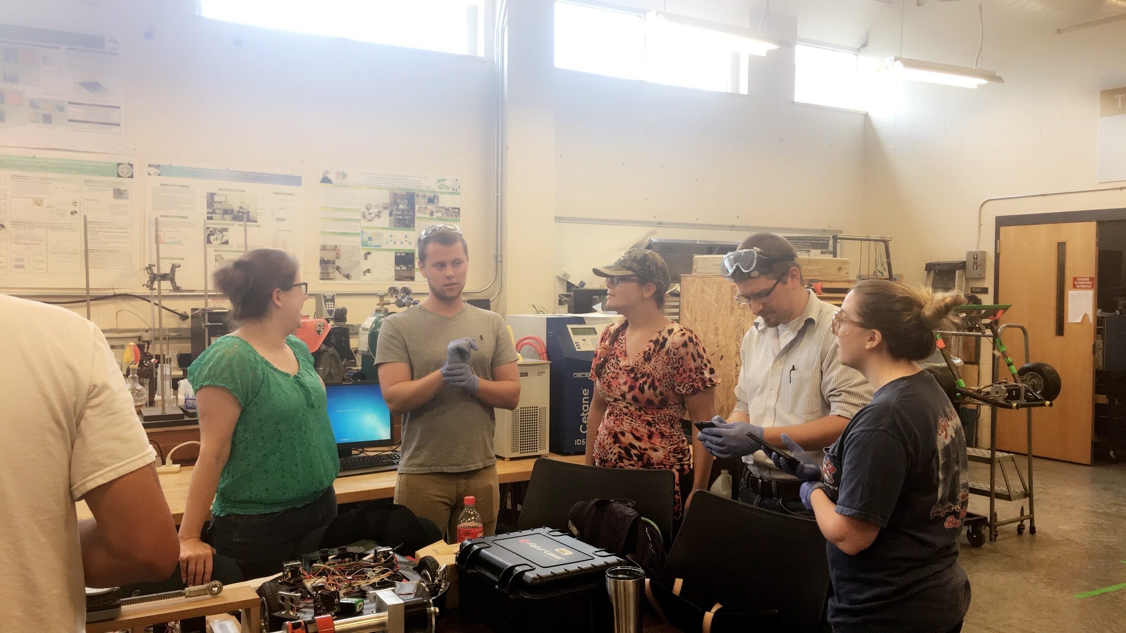 members of ENERGY collaborating in a lab