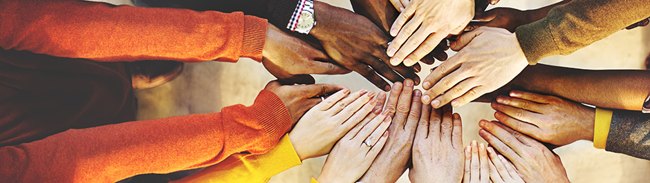 Hands joining together