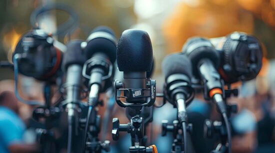 A collection of microphones like the media outlets set up for important events.