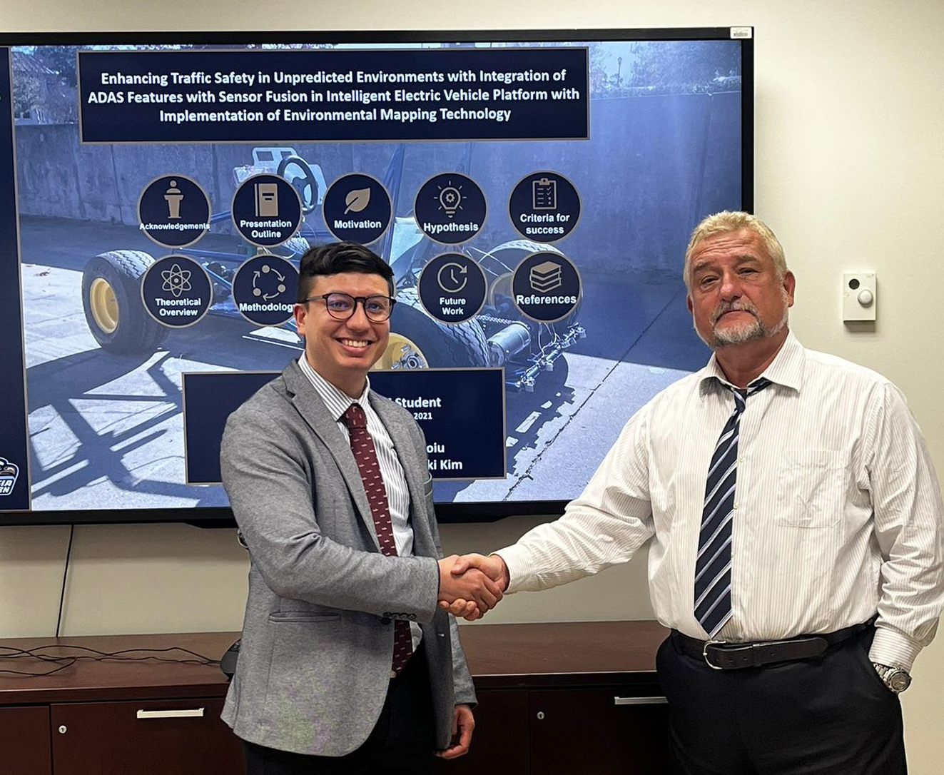 Alumni David Obando Ortegon pictured with Valentin Soloiu, Ph.D.