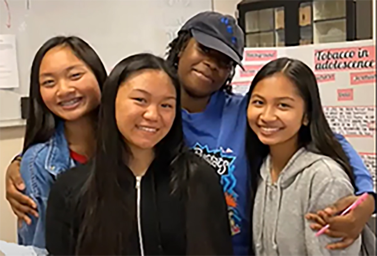 Members of Youth in Action group pose together