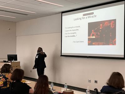 Stacey Smallwood, Ph.D. Executive Director of Wake Forest University's Faith COMPASS Center presenting at the Jiann-Ping Hsu College of Public Health Creative Scholars Showcase