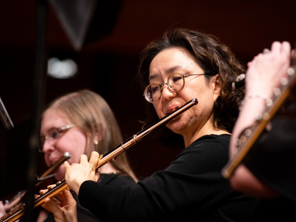 A flutist plays during a Savannah Winds concert at Fine Arts Hall on Georgia Southern's Armstrong Campus.
