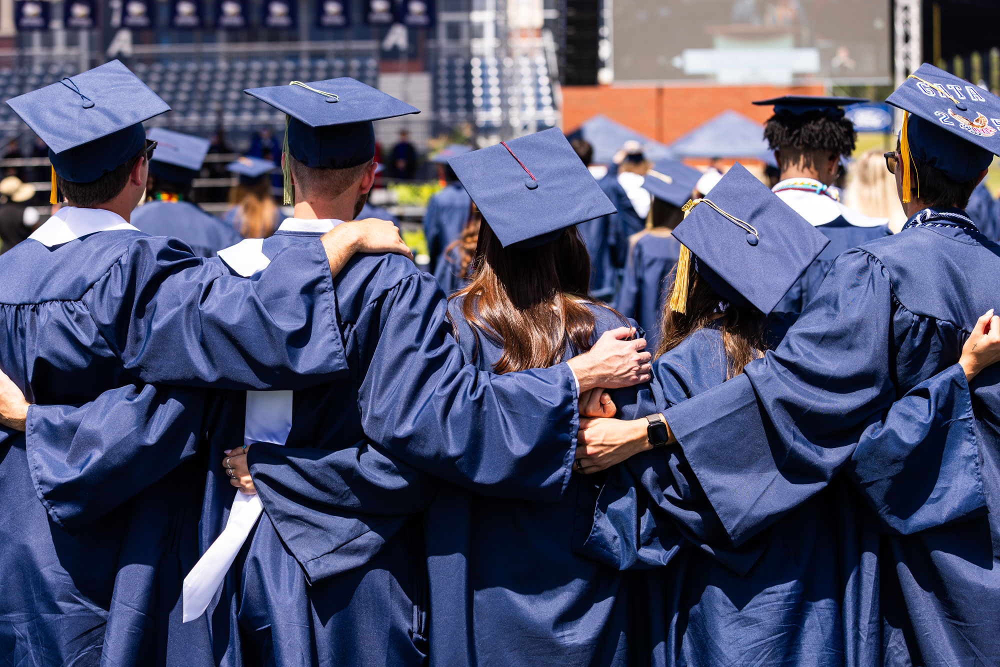 Group of Georgia Southern graduates in cap and gown.