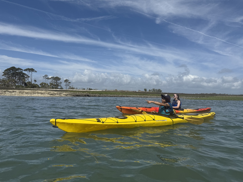 A group of Georgia Southern students take a kayak trip after completing the kayak course at the Southern Adventures CRI RAC.