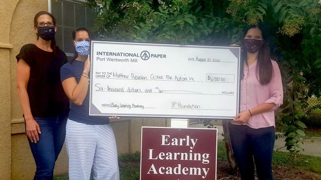 From left to right, assistant professor of psychology Jennifer Wertalik, Ph.D., and ELA Director Ciarra Torres are presented a check by Kristie Meyers, communications coordinator for International Paper. The $6,000 grant will help fund the partnership between Georgia Southern and the ELA.