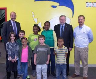 (L-R) Rob Whitaker, vice president for business and finance, and University President Brooks A. Keel, Ph.D., make a $1,500 donation to Mike Jones, executive director of the Boys and Girls Club of Bulloch County.