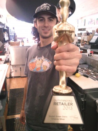 Morgan Murphy ('11) holds the 2013 Outstanding Retailer   award from Specialty Food Magazine.