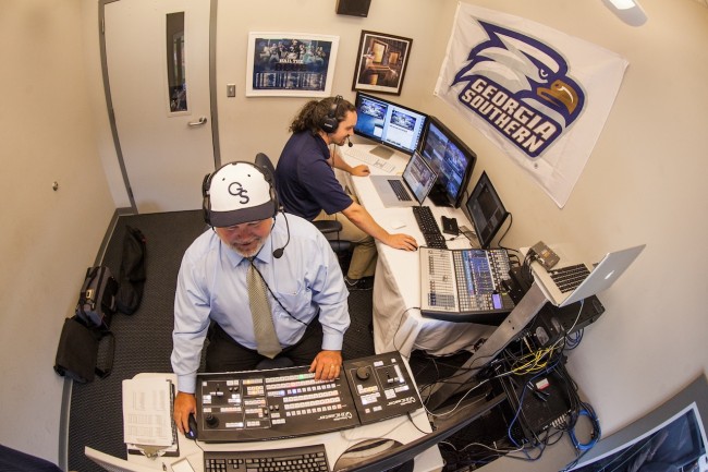 Art Berger (front) and Jeremiah Womble direct live footage for "Inside Georgia Southern Baseball." Georgia Southern University received four 2014 Emmy Award Nominations.