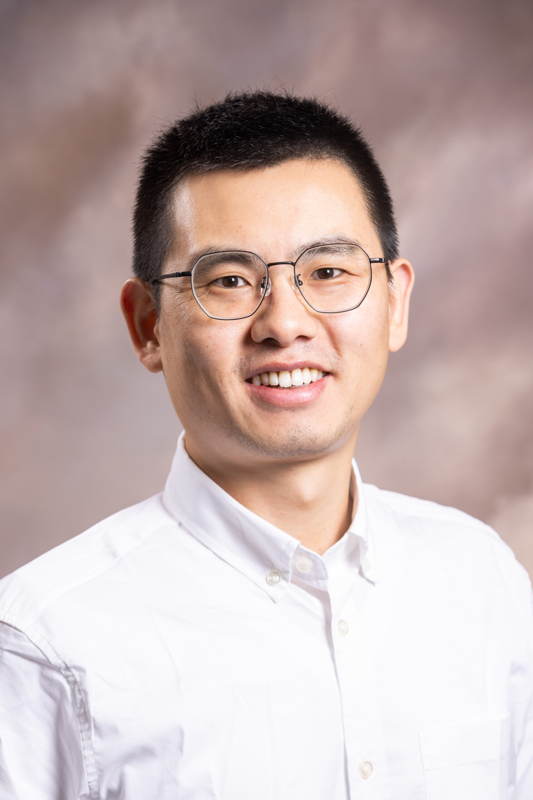 Portrait of Dr. Jianzhou He