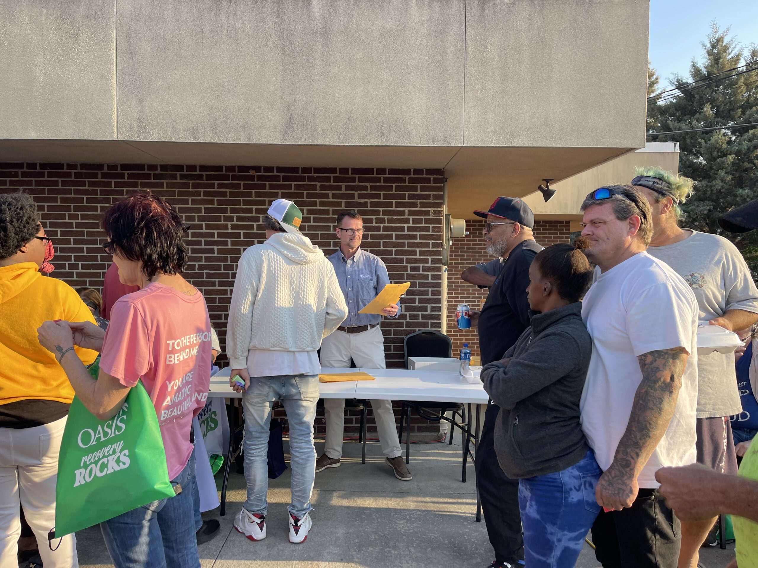 Dr. Mase distributing surveys in a rural area for needs assessment